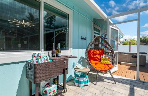 Whitney Beach Casa | NEW! Blue Iguana! Tropical backyard oasis with heated pool, hot tub, fire table, and more!