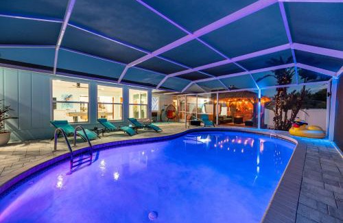 Whitney Beach Casa | NEW! Blue Iguana! Tropical backyard oasis with heated pool, hot tub, fire table, and more!