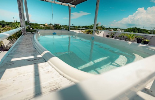 Puerto Morelos Casa | New Boutique Hotel in Puerto Morelos, 7 minutes from the beach by car.