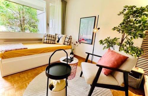 Oerlikon Apartamento | New, central studio with garden terrace and much privacy