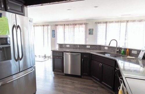 Lake of the Ozarks Casa | NEW!! Charming 4-bedroom family-friendly lakefront house in Sunrise Beach!