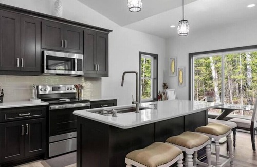 Jacksonport Casa | New, charming custom home, 7 minute walk to the beach