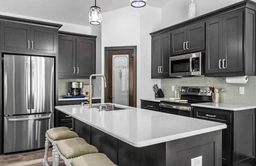 Jacksonport Casa | New, charming custom home, 7 minute walk to the beach