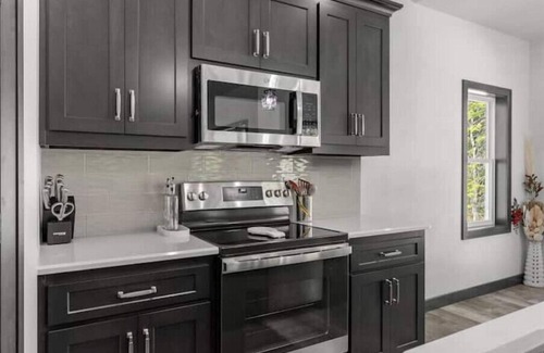 Jacksonport Casa | New, charming custom home, 7 minute walk to the beach