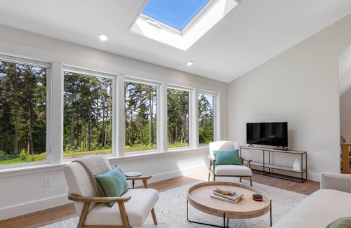 Freeland Cabaña | New construction - upper-level home with expansive deck & orchard views