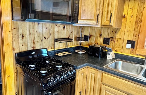 Spooner Cabaña | NEW Cottages on the Lake Near Spooner WI. Steps from sand shore of McKenzie Lake