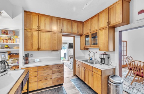 Garfield Heights Casa | NEW! Cozy Getaway with Hot Tub, Patio & Fenced Yard