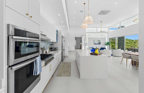 Coco Casa | New Gated Home - 6 Suites - Vacation Planning Included!