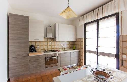 Torre del Lago Puccini Apartamento | Nuevo apartamento en planta baja con amplio jardín y plaza de aparcamiento privado.