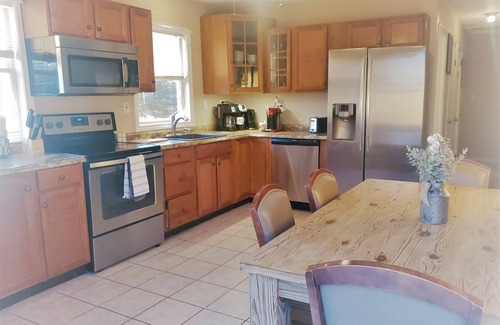Jewett City Casa | NEW Listing: LAKEFRONT Home w/ Dock, Theater Room, Firepit. Near Mystic, Casinos