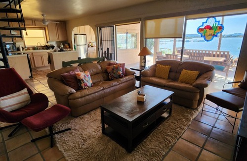 Yuma Casa | NEW LISTING The 9 Palms River House is where the Old West meets Lake House charm