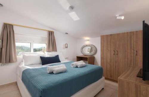 Archangelos Villa | New Loft by Ossiano Pool Villas, Heating Pool,2 min drive to Haraki Beach & 10 to Lindos