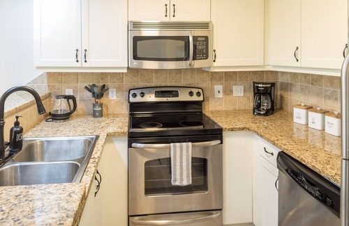 Leeward Settlement Condominio | NEW! Luxury 1-Bed Condo in Upscale Gated Community !