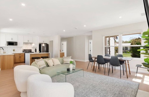 The Plaza Casa | *New* modern pool home + 5 mi to beach + sleeps 14