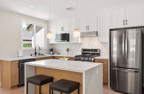 The Plaza Casa | *New* modern pool home + 5 mi to beach + sleeps 14