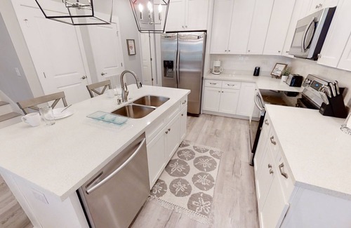 El Centro Beach Casa | NEW PCB HOUSE Close to Beach BBQ Grill, Neighborhood Pool, Free Golf Daily!