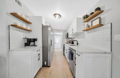 East Naples Cabaña | NEW POOL! Naples Home 2 miles to Beach/5th Ave, 2 King Beds, Hot Tub, Bikes