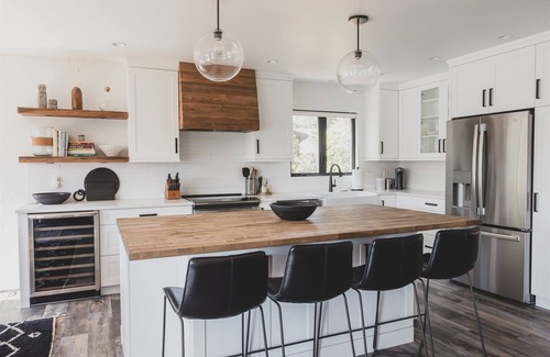 Whitefish Casa | NEW remodel w/ wood burning fireplace, wraparound deck & lake views