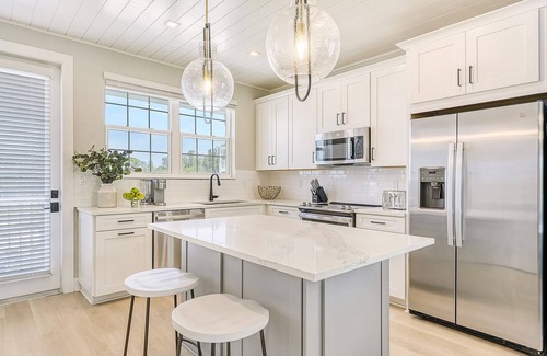 Cortez Casa | NEW! Saltwater Serenity .08 Miles to AMI, Canal Front w/Heated Pool!