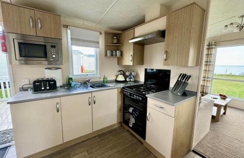 Woodhorn Otro | New Sea View Platinum Caravan with Huge Decking