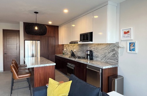 Libertad Condominio | New! Slick designer apARTtment with bay views.
