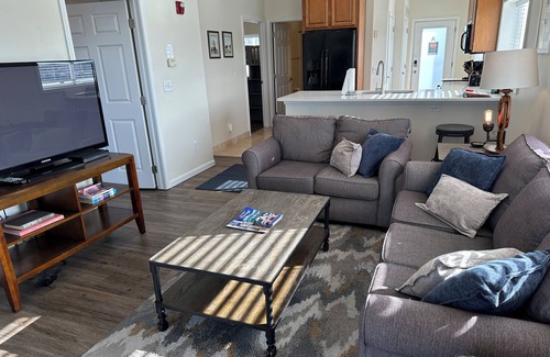 Gypsum Condominio | NEW spacious 2 BR / 2 BA w. pool, dockage available, bar