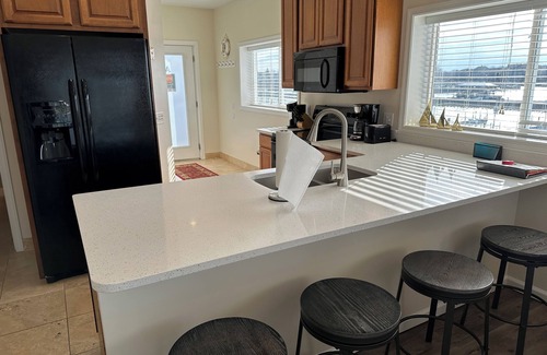 Gypsum Condominio | NEW spacious 2 BR / 2 BA w. pool, dockage available, bar