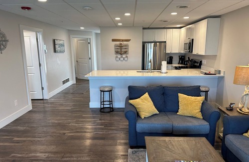 Gypsum Condominio | NEW spacious 2 BR / 2 BA w. pool, dockage available, bar