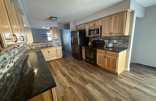 Waldo Casa | NEW Three bedroom ranch style pet friendly home with a patio & theatre room!