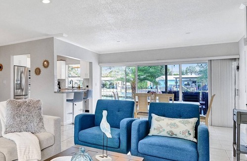 North Corals Casa | NEW Waterfront Heated Pool/Jacuzzi 2mi to Beach-Fishing Pier, Kayaks, EVCharger