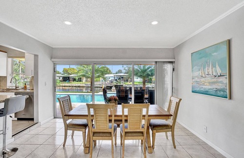North Corals Casa | NEW Waterfront Heated Pool/Jacuzzi 2mi to Beach-Fishing Pier, Kayaks, EVCharger