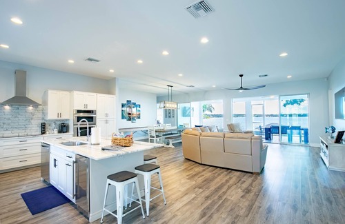 Lake Placid Casa | Newer Home on Lake June with Beach, Dock, Screened Patio and Hot Tub!