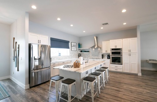 Lake Placid Casa | Newer Home on Lake June with Beach, Dock, Screened Patio and Hot Tub!