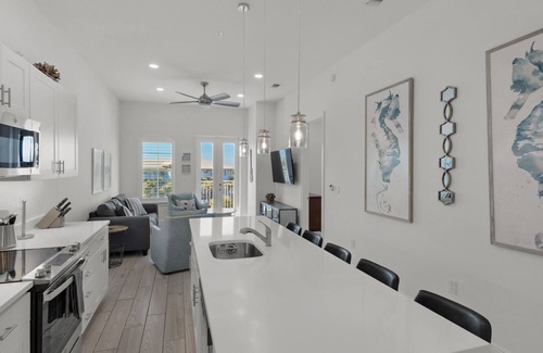 Gulf Place Condominio | Newly Built Condo w/ 3 Pools & Steps to Beach + Free Attraction Tickets!