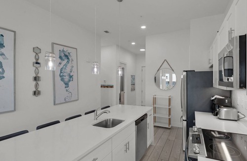 Gulf Place Condominio | Newly Built Condo w/ 3 Pools & Steps to Beach + Free Attraction Tickets!