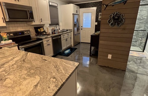 North Carolina Coast Casa | Newly renovated Beach House on Carolina Beach, PET FRIENDLY with BOAT PARKING!
