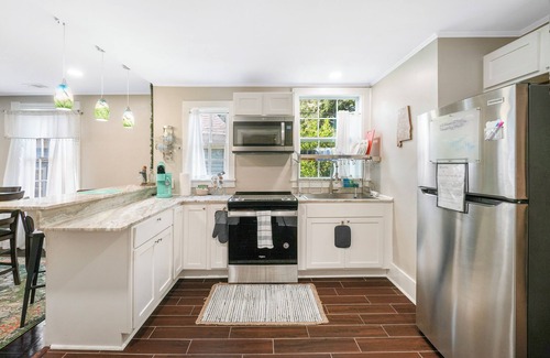 Montgomery Casa | Newly renovated Victorian home with beautiful features in quiet neighborhood.