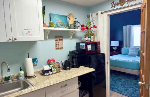 Royal Hawaiian Estates Apartamento | Hot tub in rainforest -Clean & Cozy, 5 min to Volcanoes Natl Park, coffee & Tea