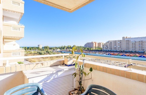 Cabanes Apartamento | Hermoso apartamento para 4 personas con piscina, A/C, TV, terraza, mascotas permitida y aparcamiento