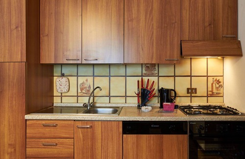 Dongo Apartamento | Bonito apartamento con jacuzzi, piscina, WIFI, TV, patio y aparcamiento