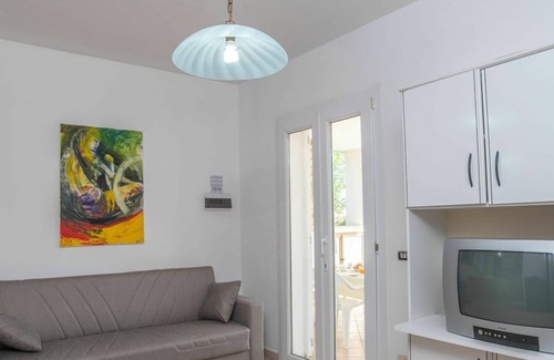 Pittulongu Apartamento | Nice apartment for 4 guests with TV, terrace, pets allowed and parking