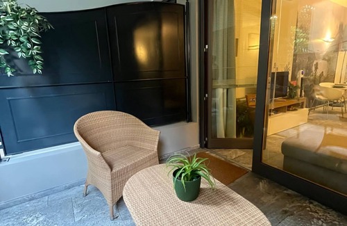 Riva Apartamento | Nice apartment inside a residence with a park of secular plants and waterfall