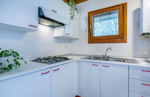 Grado Casa | Bonito apartamento en villa con WIFI, piscina, terraza, mascotas permitida y aparcamiento