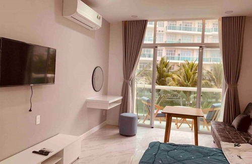 Central Mui Ne Beach Apartamento | Bonito apartamento con vistas al mar en la playa.