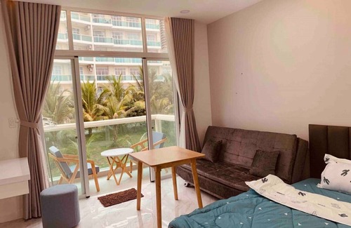 Central Mui Ne Beach Apartamento | Bonito apartamento con vistas al mar en la playa.