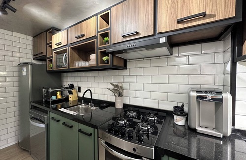 Monumental Axis Condominio | Nice apartment with Air Cond, WiFi and Bathtub