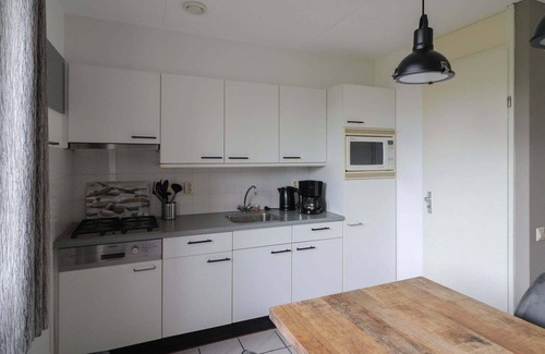 Makkum Casa | Bonita casa de vacaciones sobre el agua en Frisia