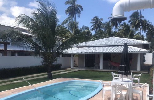 Vera Cruz Casa | Nice house with pool in Condomínio Arauá