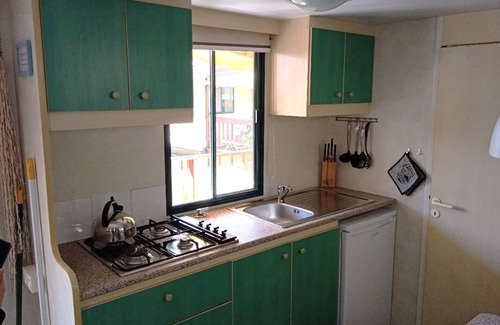 Viareggio Casa | Nice mobile home, with veranda, on the family camping Paradiso