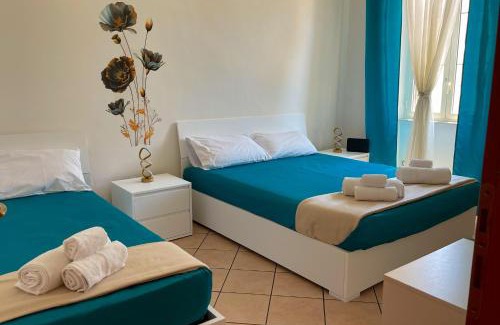 Nettuno Apartamento | NIMPHAEA BLUE APARTMENT - Elegant Central Flat, Walk to Beach & Train Station